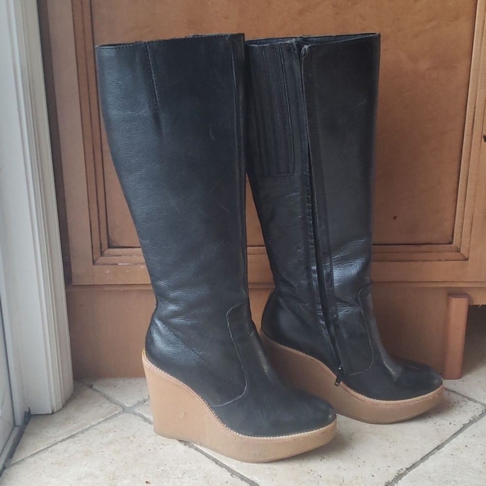 Black leather knee high boots